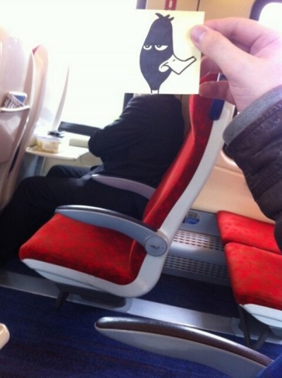 Daffy Duck hit by a train window