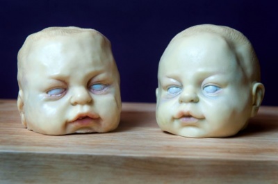 These Creepy Baby Head Chocolates