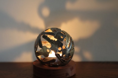 A Small Sphere Shaped Tea Light Holder