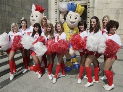 You pose with cheerleaders..a lot