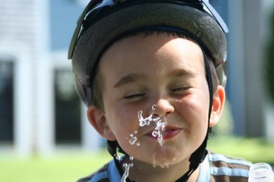 Laughing While Drinking Water 