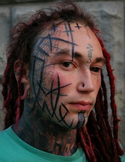 Arc face tattoo