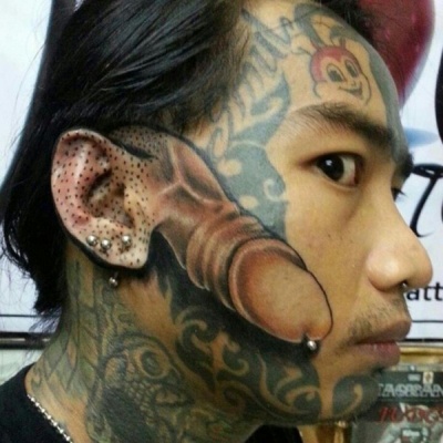 Penis Tattoo On Face 