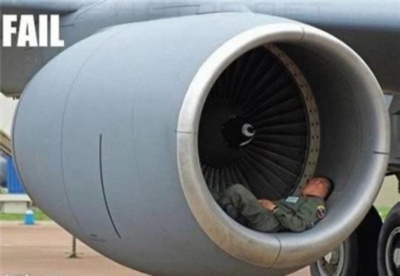 Airman Taking a Nap Inside Aircraft's Turbine 