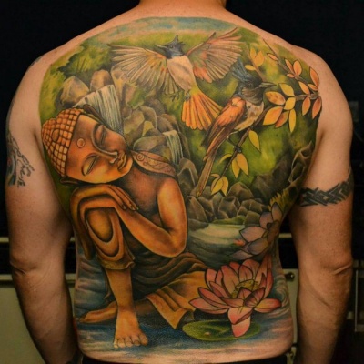 This Colorful And Wonderful Buddhist Tattoo