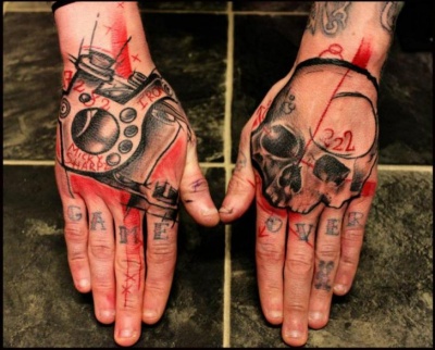 This Impressive Trash Polka Hand Tattoo