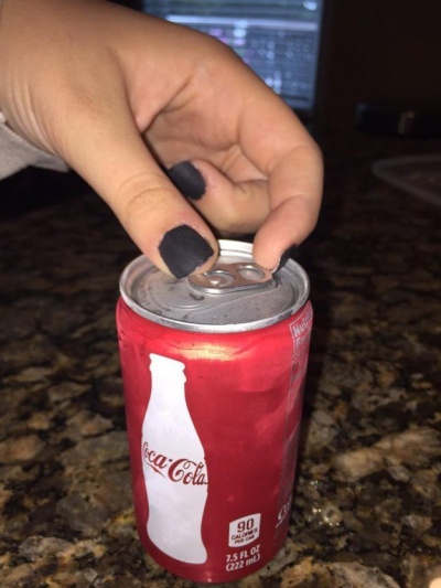 The Struggle of Opening a Soda Can