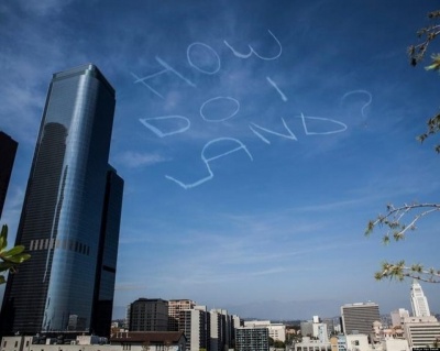 Plane Writing Stupid Things On Clouds