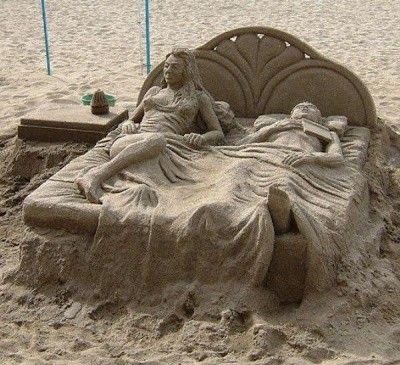 Couple sleeping on bed sand art